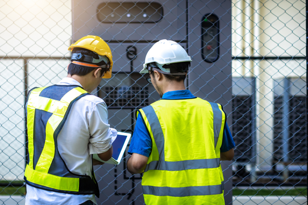 "A participant using a multimeter to measure voltage and troubleshoot electrical circuits."